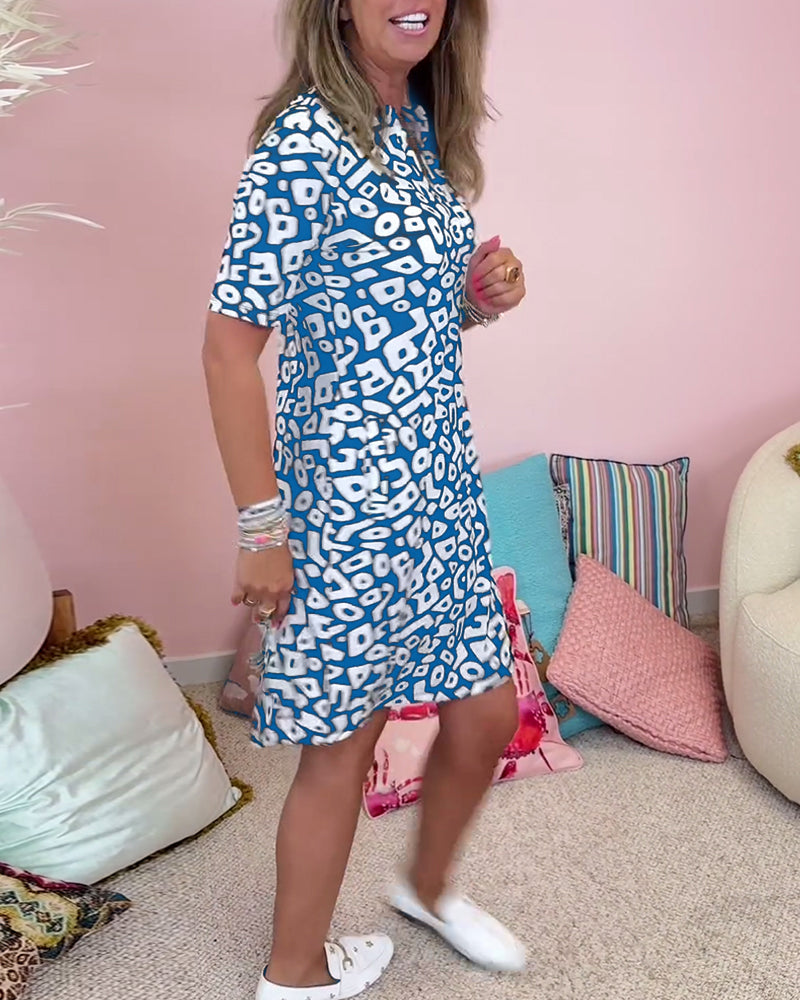 MALIA | Robe d'été décontractée avec col rond et poches imprimées originales