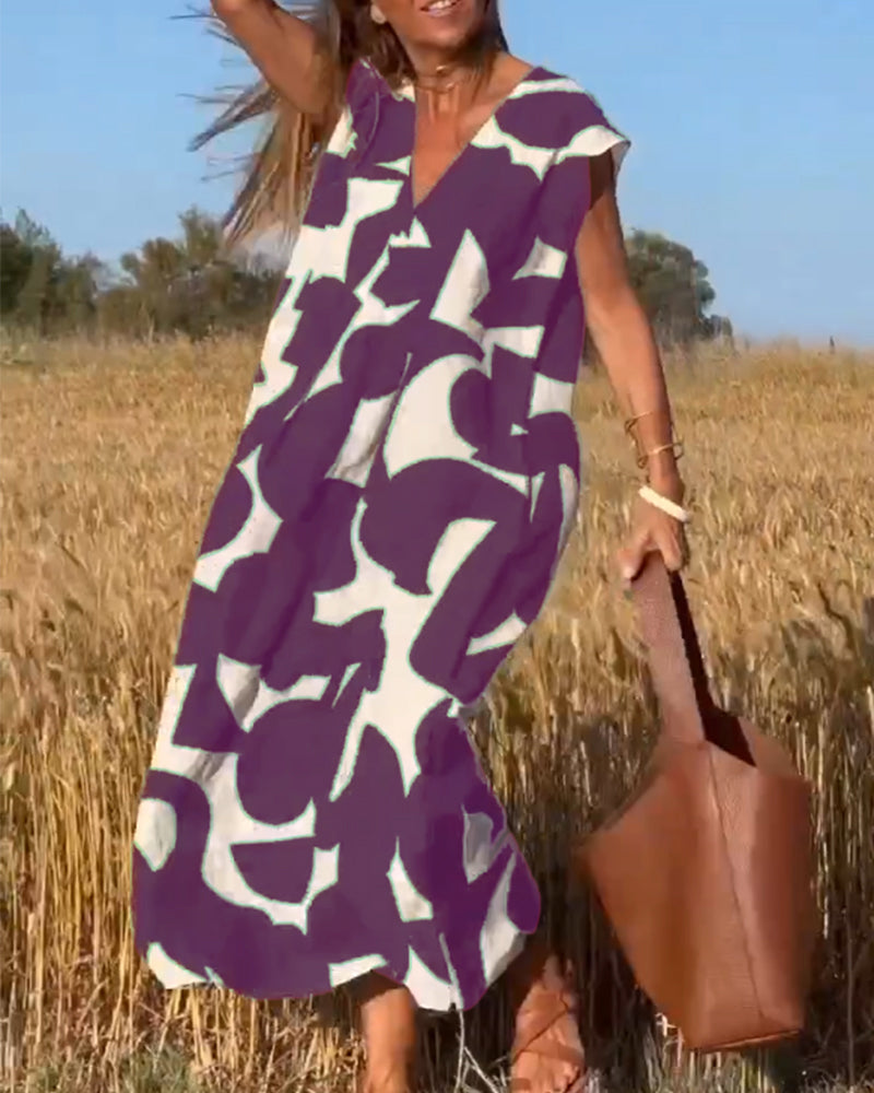 NAOMI | Robe Longue Imprimée avec Décolleté en V et Coupe Évasée pour un Look de Vacances