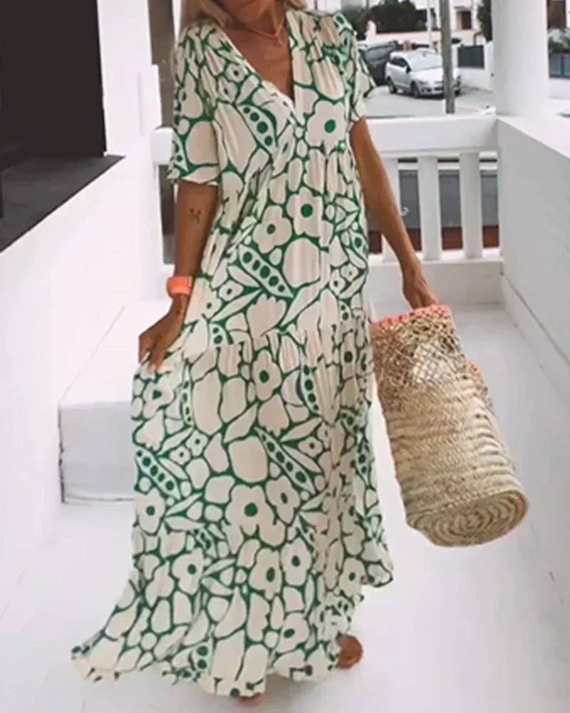 CHRISTINE | Robe d'été longue avec coupe fluide et motif graphique élégant