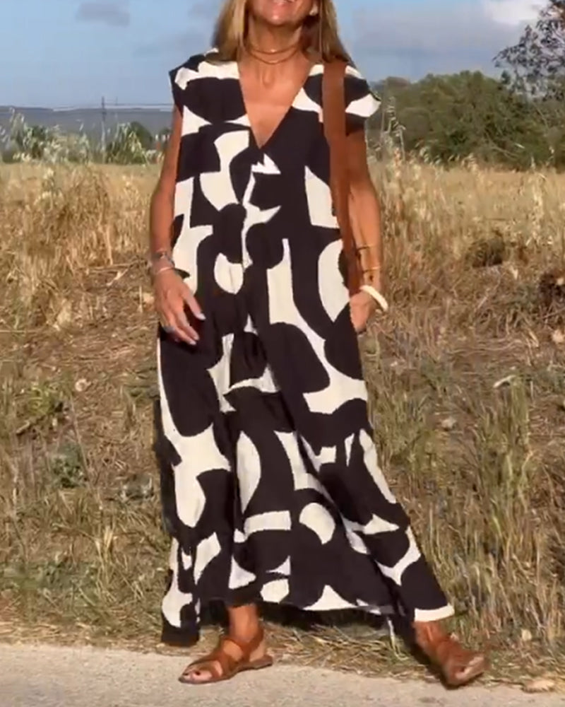 NAOMI | Robe Longue Imprimée avec Décolleté en V et Coupe Évasée pour un Look de Vacances