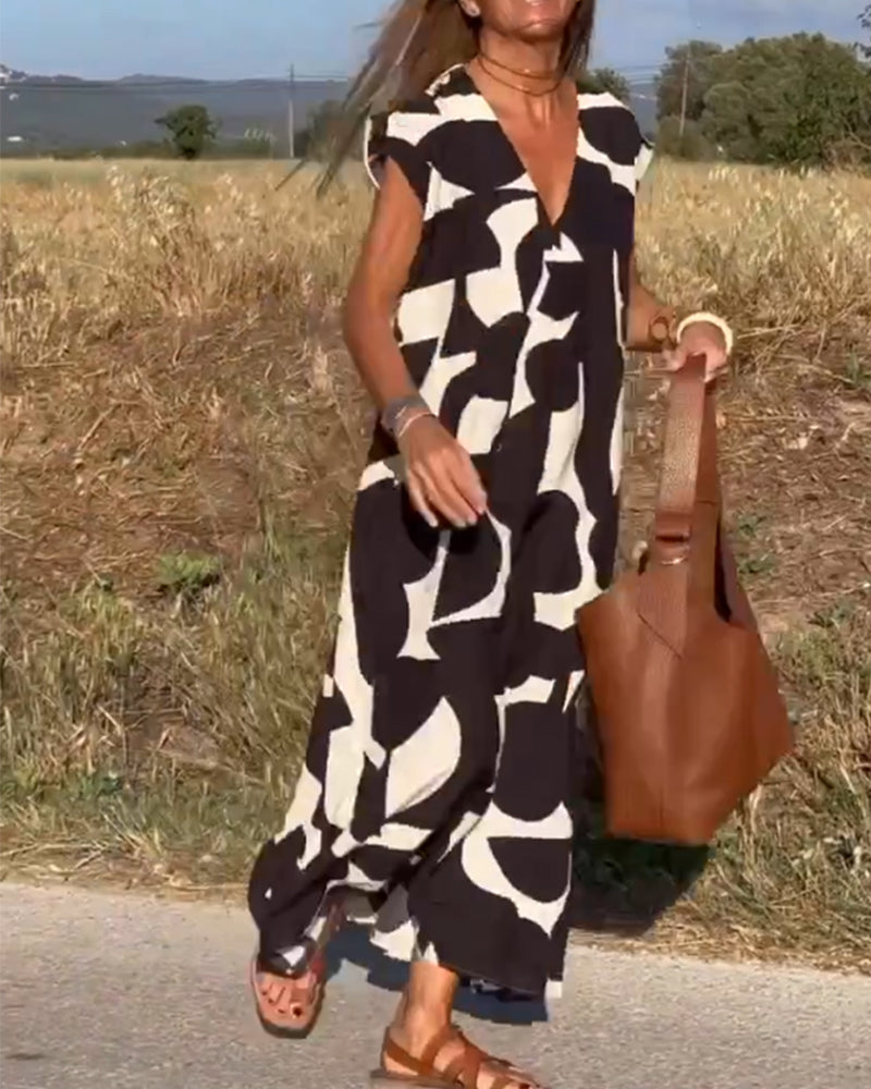 NAOMI | Robe Longue Imprimée avec Décolleté en V et Coupe Évasée pour un Look de Vacances