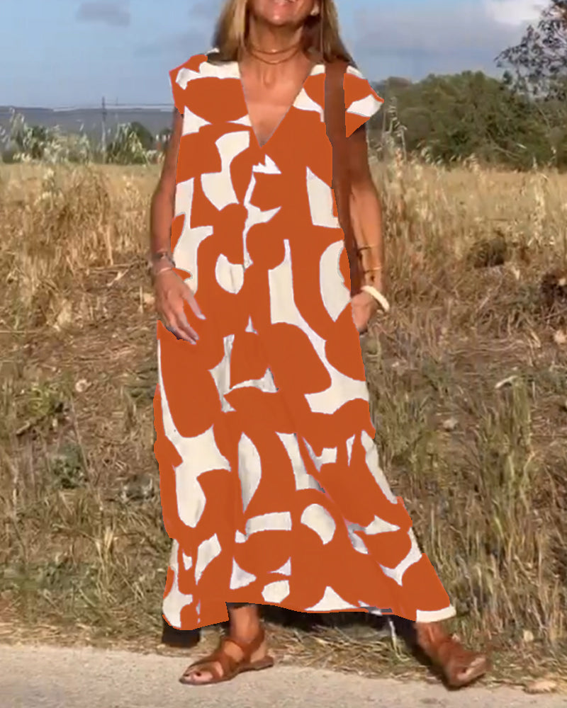 NAOMI | Robe Longue Imprimée avec Décolleté en V et Coupe Évasée pour un Look de Vacances
