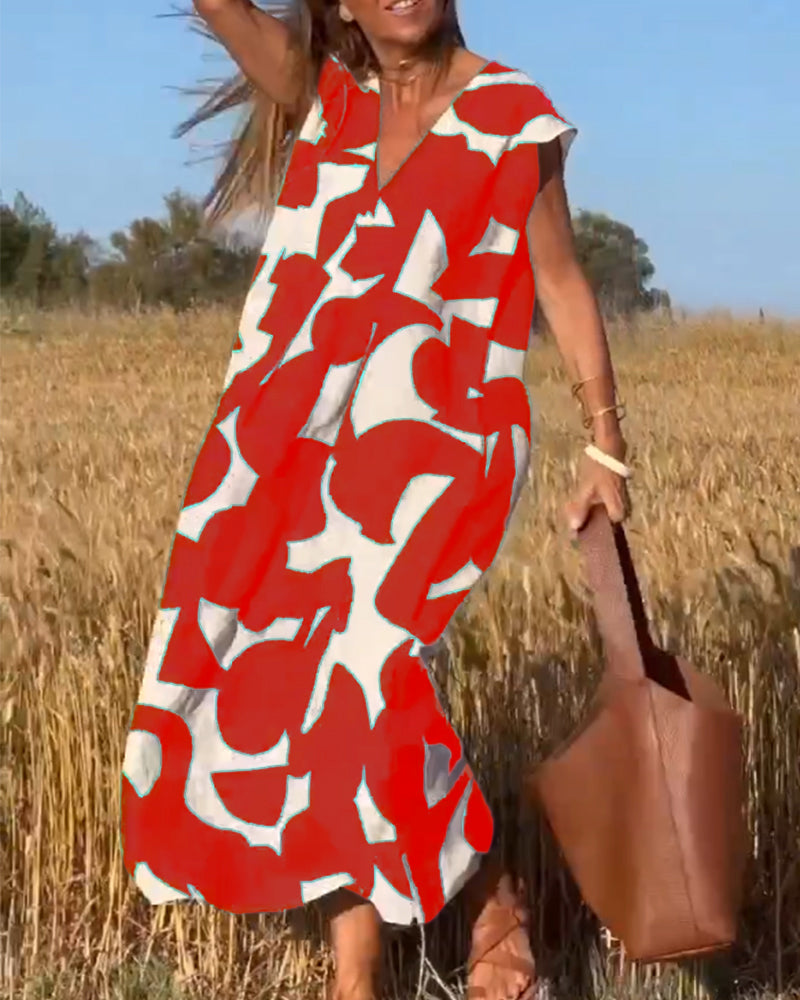 NAOMI | Robe Longue Imprimée avec Décolleté en V et Coupe Évasée pour un Look de Vacances