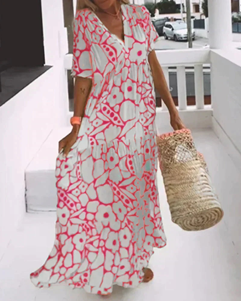 CHRISTINE | Robe d'été longue avec coupe fluide et motif graphique élégant