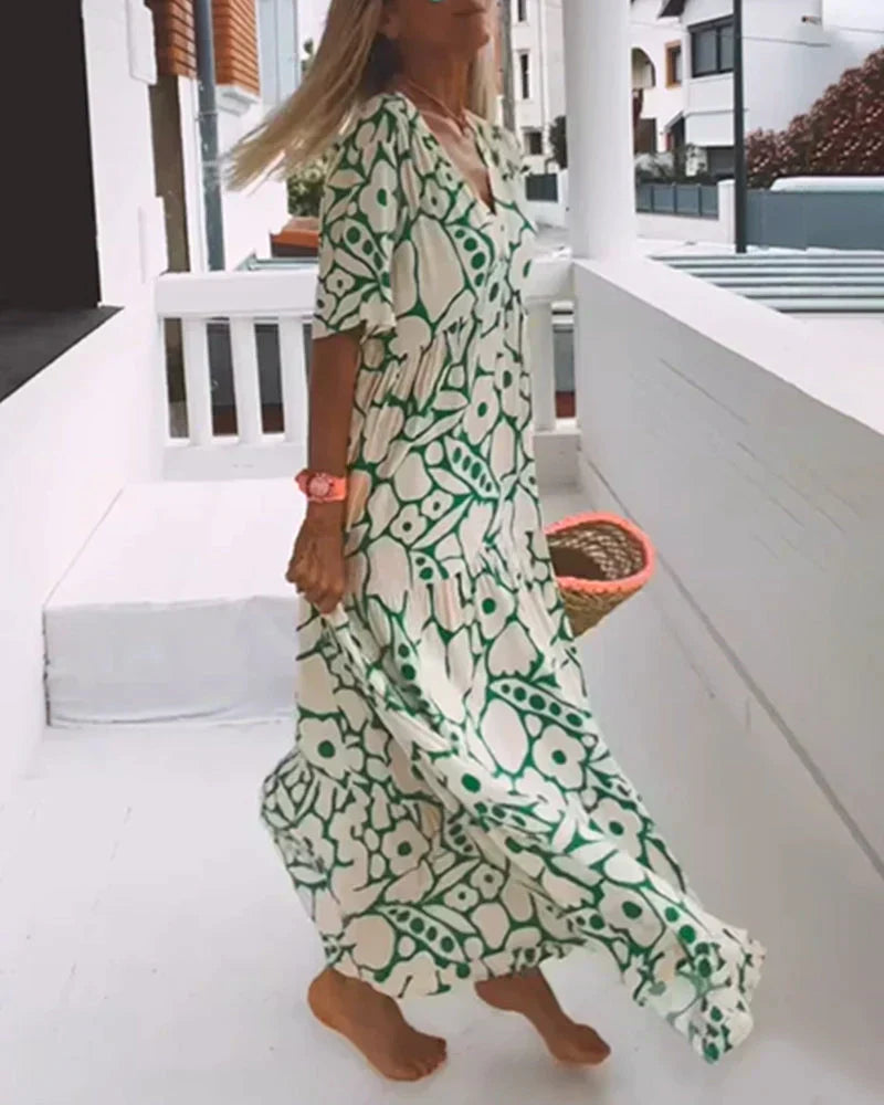 CHRISTINE | Robe d'été longue avec coupe fluide et motif graphique élégant