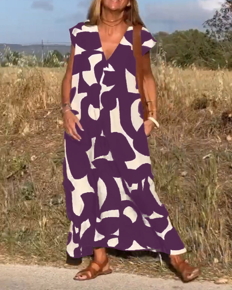 NAOMI | Robe Longue Imprimée avec Décolleté en V et Coupe Évasée pour un Look de Vacances