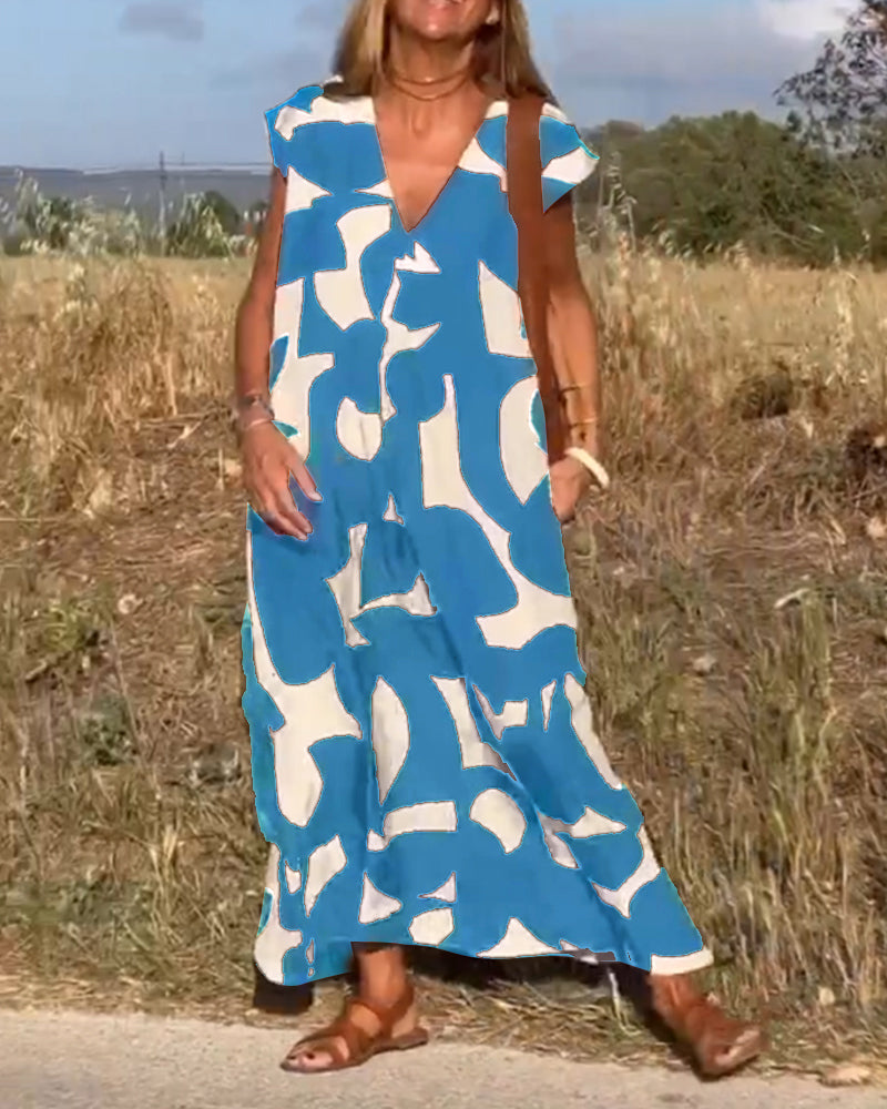 NAOMI | Robe Longue Imprimée avec Décolleté en V et Coupe Évasée pour un Look de Vacances