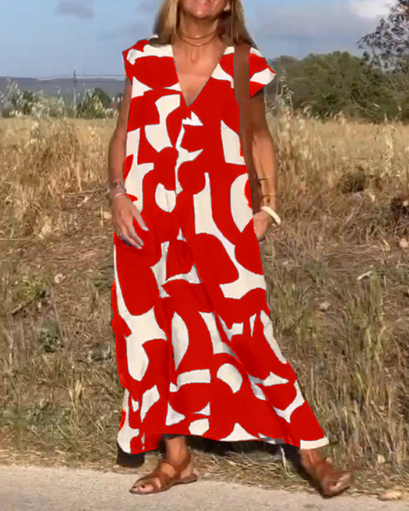 NAOMI | Robe Longue Imprimée avec Décolleté en V et Coupe Évasée pour un Look de Vacances