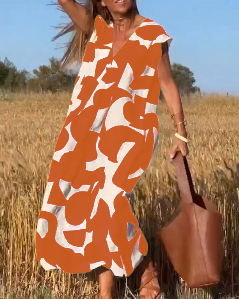 NAOMI | Robe Longue Imprimée avec Décolleté en V et Coupe Évasée pour un Look de Vacances