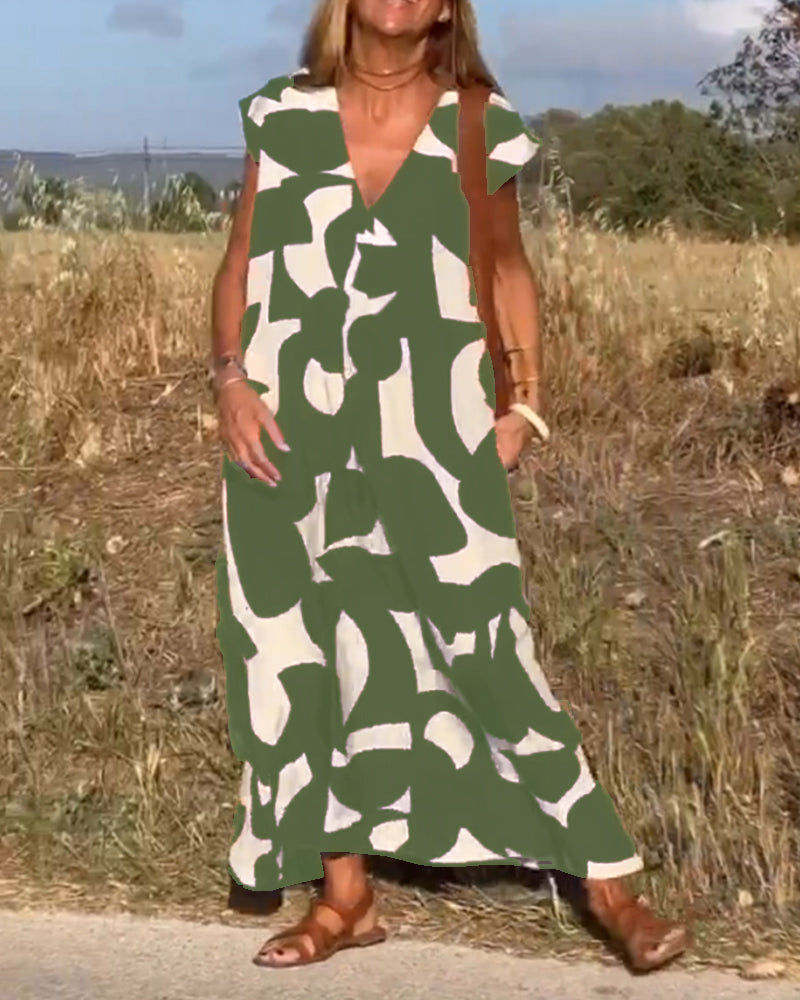 NAOMI | Robe Longue Imprimée avec Décolleté en V et Coupe Évasée pour un Look de Vacances
